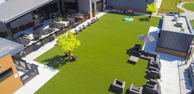 Drone shot of commercial artificial grass lawn installed by SYNLawn