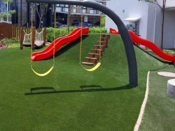 Swigset installed on artificial grass surface