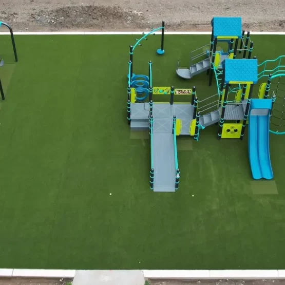 Drone shot of artificial grass playground