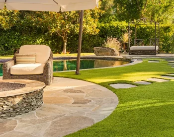 Artificial grass backyard pool area from SYNLawn