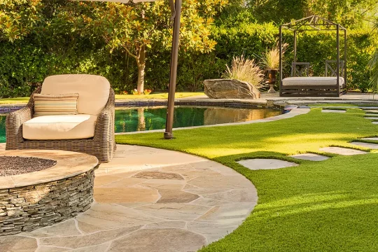 Artificial grass backyard pool area from SYNLawn