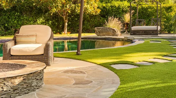 Artificial grass backyard pool area from SYNLawn