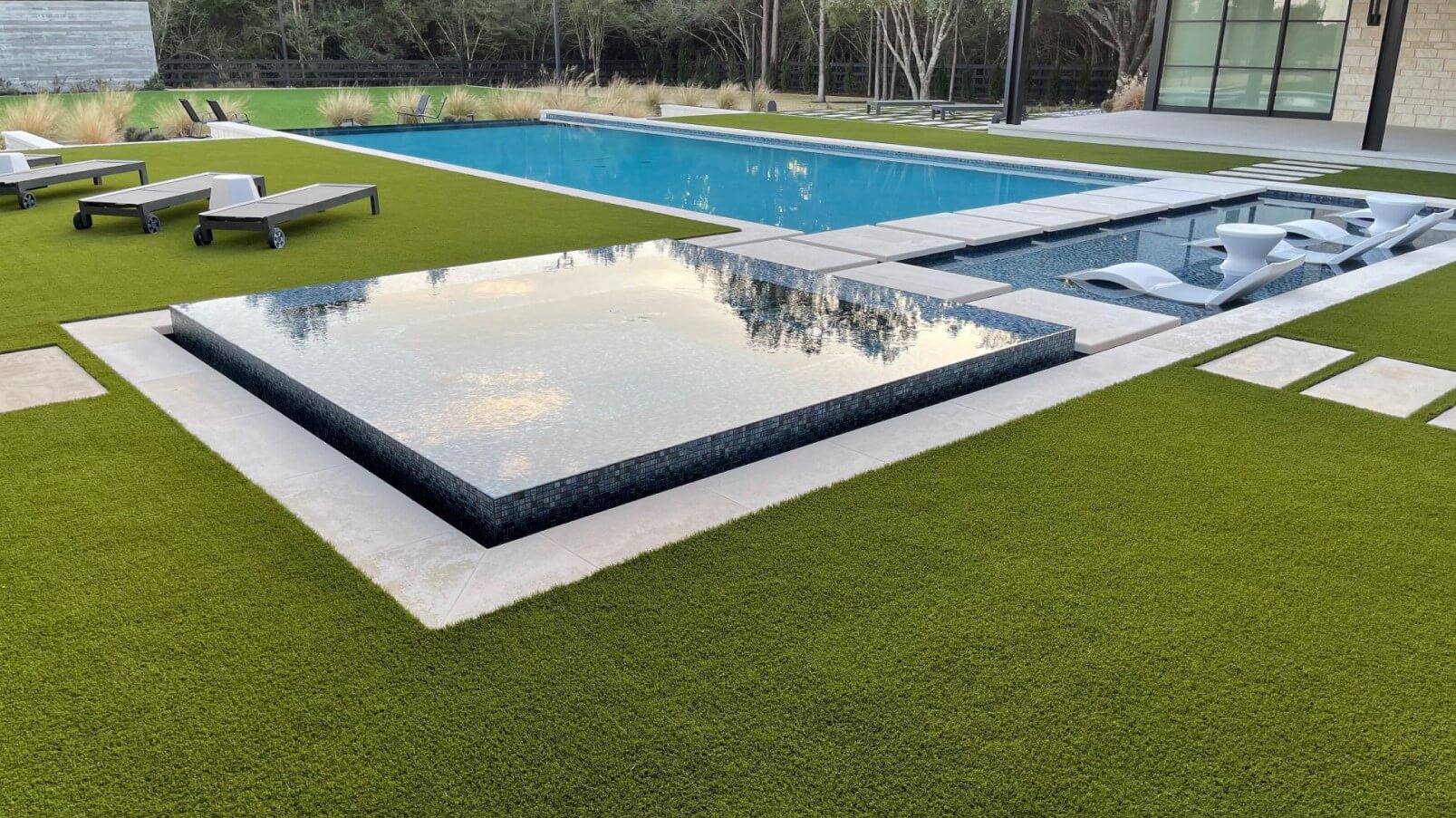 Artificial grass pool area installed by SYNLawn