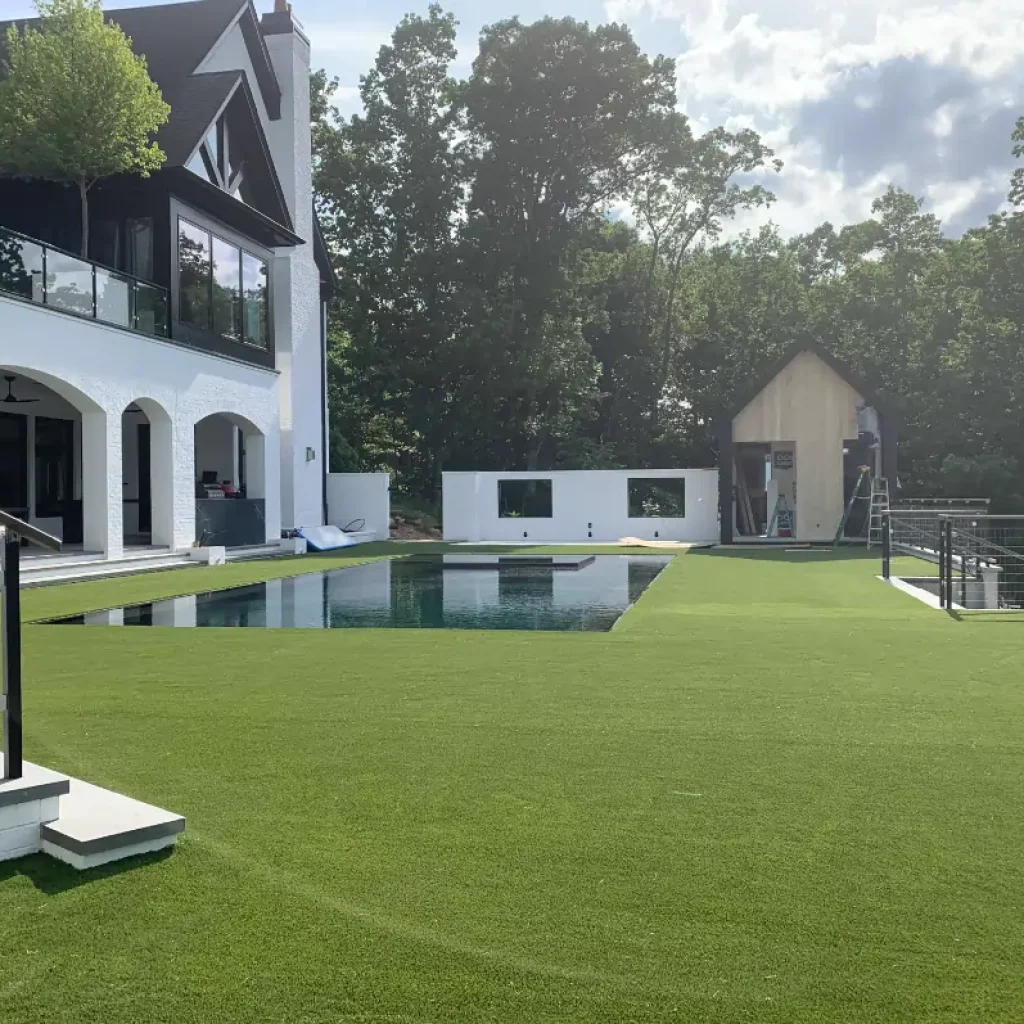 Backyard artificial grass pool area from SYNLawn
