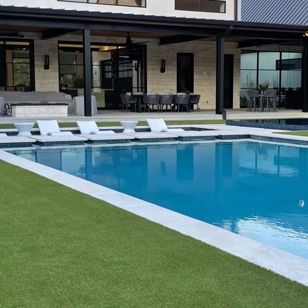 Artificial grass backyard pool area from SYNLawn