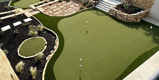 synlawn-artificial-grass-highfill-ar-golf Backyard golf green installed by SYNLawn