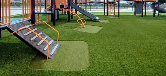 synlawn-artificial-grass-highfill-ar-playground SYNLawn artificial grass playground